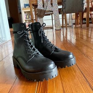 Never worn Steve Madden black combat boots!
